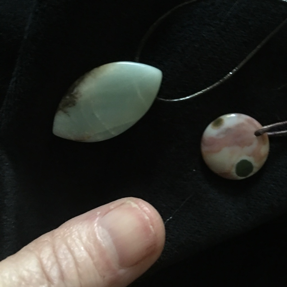Two Pendants on Leather Thongs: Pink Orbicular Jasper and Amazonite Fat Crescent